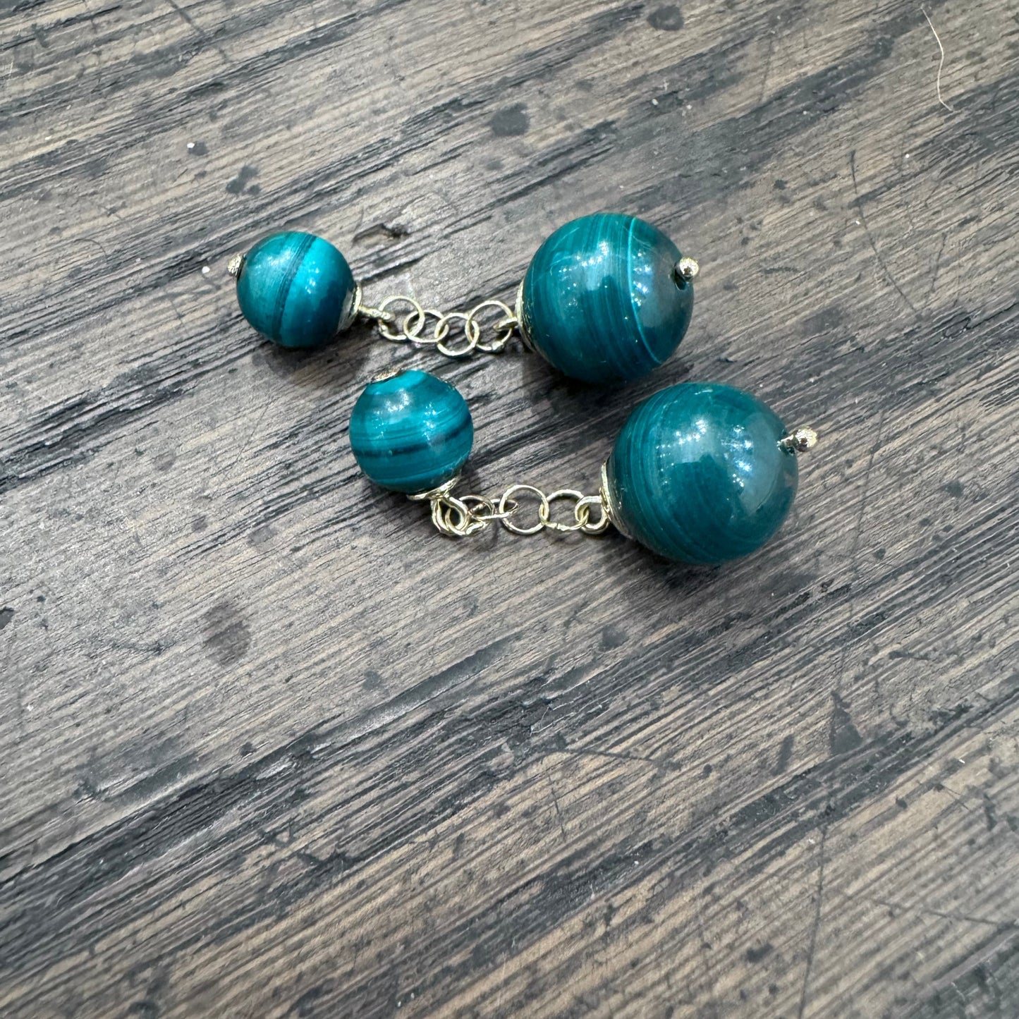 GEMELLI DIVERSI in Oro e Malachite